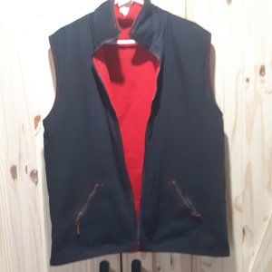 Spanner Sport two sided vest red one side and black the other side insulated.